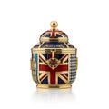 Ornate gold and Union Jack decorated jar with lid and iconic London landmark designs.